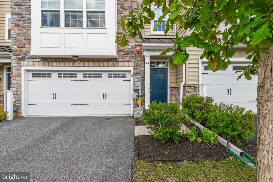 Experience exceptional living in the sought-after community of The Reserve at Rose Tree, situated within the acclaimed Rose Tree Media School District. This exquisite 6 year-young residence offers a rare opportunity, occupying a premium lot that backs to a serene and private wooded landscape with steps off the deck to access this green-space.
This lovely home has been impeccably refreshed with fresh, neutral paint throughout, plush new carpeting on the upper and lower levels, and stylish new light fixtures throughout. These recent updates complement an existing package of over $45,000 in builder upgrades, creating a truly turnkey property.
The sun-drenched main level impresses with stunning hardwood floors and architectural bump-outs that enhance both the living room and primary bedroom. The living room, centered around a remote-controlled gas fireplace, flows seamlessly into a generous kitchen and dining area. The gourmet kitchen is a chef's delight, featuring granite countertops, a large island with seating for four, a stainless steel appliance suite—including a refrigerator, double wall ovens, and a chic tile backsplash. A powder room with a pedestal sink completes this level.
Upstairs, the owner’s suite serves as a private retreat, featuring an expanded footprint, a large walk-in closet, and a luxurious primary bathroom with granite countertops and an oversized, fully tiled walk-in shower. Two additional well-proportioned bedrooms, a full hall bathroom, and a convenient laundry area round out the upper floor.
The versatile lower level includes a finished family room/den that opens through sliding glass doors to a maintenance-free composite deck, where you can enjoy expansive views of nature. The owners also recently added stairs with a deck-level gate to access the common area. This level also offers a newer 2nd powder room for additional convenience from the deck, the lower level area and the garage!
Enjoy a maintenance-free lifestyle with the HOA managing lawn and seasonal cleanup. Community amenities include a bocce court, soccer field, playground, and direct access to the walking trails of Mineral Hill Park. All this, just minutes from the vibrant shops and restaurants of downtown Media. This is a unique offering of modern luxury and pristine condition in a premier location.