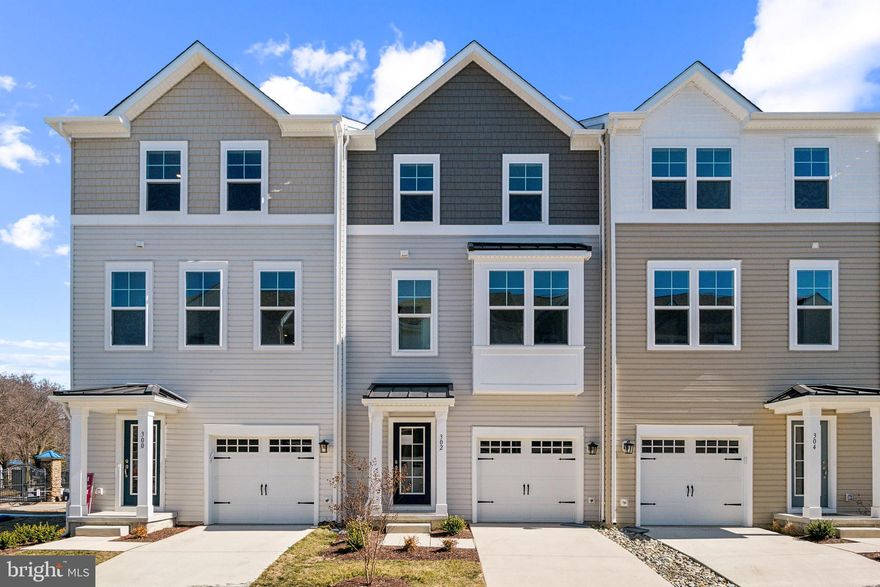 Final opportunity to buy a brand new home in the Deep Harbour community! We are down to our last few homesites! This brand-new home is only steps away from the water and ready now for IMMEDIATE MOVE-IN!!  The community is nestled along Cambridge Creek, in a highly-desired, gated community, offering stunning water views, a private marina, a community pool with a bathhouse, a riverwalk throughout, and the convenience of low-maintenance living. The home boasts 1,796 square feet of living space spread across three levels. With three bedrooms and a one-car attached garage, this new construction townhome has plenty of room for all your needs. On the first floor, you'll find a finished rec room, perfect for a home office or additional entertaining space. The second floor features a spacious kitchen with a large island, upgraded countertops, backsplash, pendant lights, and hard surface floors. Adjacent to the kitchen is a dining area, open great room, and rear deck, ideal for entertaining. Upstairs, you'll discover three well-sized bedrooms, including the primary suite. The primary bathroom features two vanities, a spacious shower, and a walk-in closet. Centrally located in Cambridge, this townhome offers easy access to Route 50, making it convenient for commuting or traveling to nearby areas. Additionally, you'll be able to enjoy the charm of downtown Cambridge, with its diverse selection of restaurants and boutiques. Whether you're looking for a cozy dining experience, or unique shopping opportunities, the downtown area has it all. Explore the local shops, dine at delicious eateries, and immerse yourself in the vibrant atmosphere of Cambridge. Don't miss out on the opportunity to explore all that Deep Harbour has to offer. Schedule a viewing today and make this beautiful townhome your new home! On-site Sales Office Hrs: 10 AM-5 PM, Everyday! Model Address: 527 Seaway Ln, Cambridge, MD 21613. **Pricing, features, and availability is subject to change without notice. See a New Home Counselor at Deep Harbour for details. Beazer Homes - MHBR No. 93.