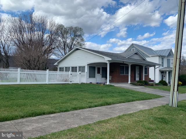 BEAUTIFULLY-KEPT BRICK HOME ON .27 AC. W/ WHITE VINYL FENCING, MANICURED LOT, NEWER ROOF. KITCHEN W/ APPLIANCES, SEPARATE DINING RM., FORMAL LIVING RM., FLORIDA RM TO USE YEAR-ROUND! 3 BEDRMS. W/ 1/5 BA. FULL BASEMENT W/ WASHER/DRYER, SHELVES, STORAGE. CENTRAL VACUUM. CARPET & VINYL FLOORING. CITY WATER & SEWER. HEAT PUMP W/ CENTRAL AIR. LOW MAINTENANCE AND READY TO MOVE IN!