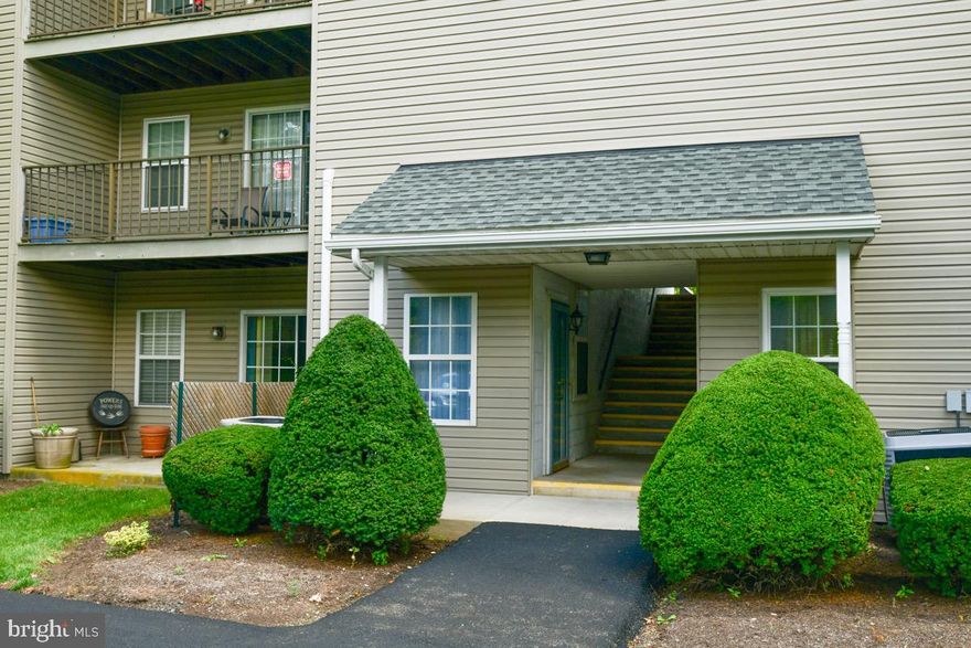 This is a one floor condo in popular Seven Oaks community in the Wilson School District with access to the unit being totally flat from the parking lot.  There is a large living room area which is carpeted leading to the dining room and kitchen. The living room also has a sliding door to the patio for those lazy evenings and there is also a half bath. The galley style kitchen with its stainless steel appliances and plentiful cabinetry and double sink make cooking an easy task. Off the kitchen is a room with the electric heat pump furnace and water heater providing easy access. All the rooms are open to one another for that special spacious feeling.  The large master bedroom offers a walk-in closet and access to the main bath.  The second bedroom is just off the main bath area.  This condo is perfect for anyone especially if they need one floor living and easy access from the parking lot.  It's just a few steps from the lot to the front door.  If you are having guests there is additional parking on the lot above with covered steps down to the condo. This home is in move in condition with nothing to do, but move in!