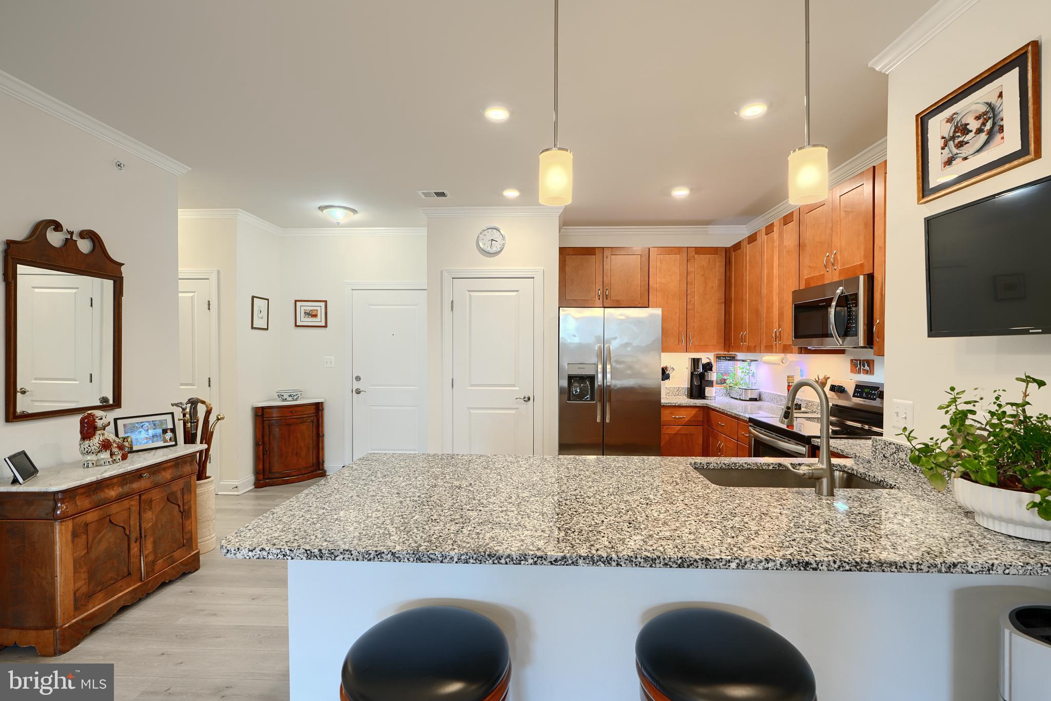 THE ONE YOU'VE BEEN WAITING FOR !!Exquisite Fully Upgraded Penthouse Condo in the Sought-After Bulle Rock Area!
Experience luxury living in this breathtaking penthouse featuring high-end upgrades throughout. The Bel Air condo includes a deeded garage and an extra-large, upgraded storage room located on the main entrance floor for added convenience. Enjoy seamless access via a luxurious elevator that takes you to the 4th floor, where you'll find two spacious bedrooms, two full and half baths and a large laundry room with built-ins. The beautiful gourmet open-concept kitchen boasts a breakfast peninsula and pantry, opening to both the living and dining areas—ideal for entertaining. Upgraded LVP flooring, crown molding, and premium finishes create an elegant ambiance. The large owner’s suite features a private balcony access, a walk-in closet, and an en-suite full bath. Second bedroom is large with it's own en-suite bathroom and walk in closet as well! Step outside to the expansive balcony overlooking the tranquil private courtyard.
Community amenities include a stunning 37,000 sq. ft. clubhouse, two tennis/pickleball courts, bocce, shuffleboard, a fitness center with professional staff, a full-time lifestyle director, business center/cyber cafe, private library, indoor/outdoor pools, and scenic walking/bike trails. Bulle Rock Golf Course, ranked as Maryland’s best public course, is just minutes away. Enjoy convenient access to I-95 and major cities . Commuters will appreciate the proximity to the MARC/Amtrak station for quick day trips. Don’t miss the opportunity to make this exceptional condo your new home. Schedule your visit today! This one won't last long at this price.