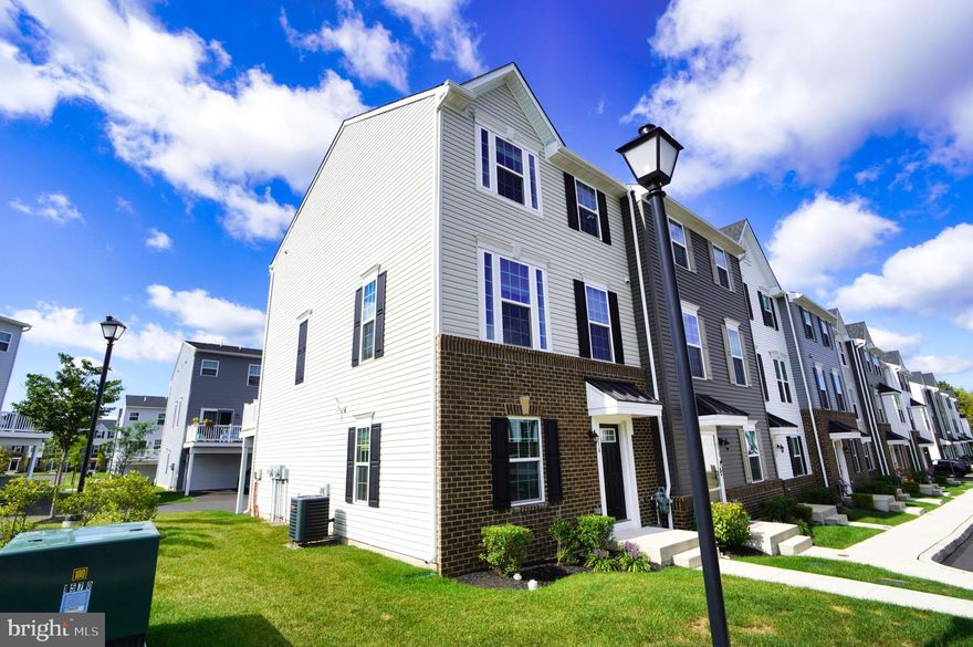 Beautiful newer fully upgraded 3 story end unit townhome in the new and desirable community of Andale Green offers a den room on the first floor with hardwood floor and two car garage access. On the main living level, you're greeted by an enormous Living Room with an abundance of natural light and hardwood flooring throughout! A very large eat-in kitchen w/ brand new stainless steel appliances and over-sized countertops. Up a flight of solid wood stairs, brand new carpet throughout the upper level, boasts three bedrooms, two baths, and a full sized 2nd floor laundry with extra cabinet space. Generous closets abound in both bedrooms, and the hall bath features its own linen closet. The Owner's Bedroom accented with a tray ceiling and featuring an enormous walk-in closet. The Owner's Bath boasts a soaking tub and separate shower. Community boasts open space, extra parking, luscious landscaping and extensive walking trails that will lead you either to the scenic park across the street, train Station, as well as downtown Lansdale. The owner will pay HOA.