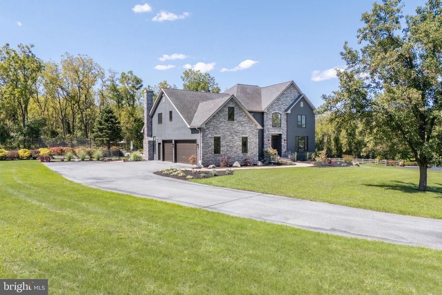 Welcome to the ULTIMATE RETREAT, designed for COMFORT, ACTIVITY, and MAKING MEMORIES with friends and loved ones. Offering NEARLY 5,000 FINISHED SQUARE FEET, this 4-BEDROOM, 5-BATH HOME is set on a QUIET CUL-DE-SAC and perfectly suited for a life full of sports, recreation, and togetherness. The main level features expansive gathering spaces that flow into a CHEF-INSPIRED KITCHEN WITH GRANITE COUNTERTOPS, CUSTOM CABINETRY, AND A SPACIOUS CENTER ISLAND—perfect for cooking, casual meals, or hosting holidays. The family room with a GAS FIREPLACE makes a cozy spot on chilly nights, while a mudroom and attached 3-CAR GARAGE keep things practical for everyday life. Upstairs, the PRIVATE PRIMARY SUITE WITH SPA-LIKE BATH AND SITTING ROOM is joined by three additional ensuite bedrooms and a convenient second-floor laundry room. Altogether, the home offers FIVE BATHROOMS to keep mornings running smoothly. The FINISHED WALKOUT LOWER LEVEL is built for fun, with a recreation area, half bath, and a BRAND NEW SAUNA—ideal for post-game relaxation. Outdoors, it’s a true sports and entertainment hub: a HEATED SALTWATER POOL AND SPA, TENNIS & PICKLEBALL COURT, and NEWLY LANDSCAPED YARD perfect for gatherings, barbecues, or kids’ play. A SOPHISTICATED NEW SECURITY SYSTEM WITH HARD-WIRE BACKUP provides peace of mind. Minutes from Rt. 78, downtown Easton and Bethlehem, shopping, and recreation, this property is about LIVING WELL, STAYING ACTIVE, and ENJOYING TIME WITH THE PEOPLE WHO MATTER MOST.