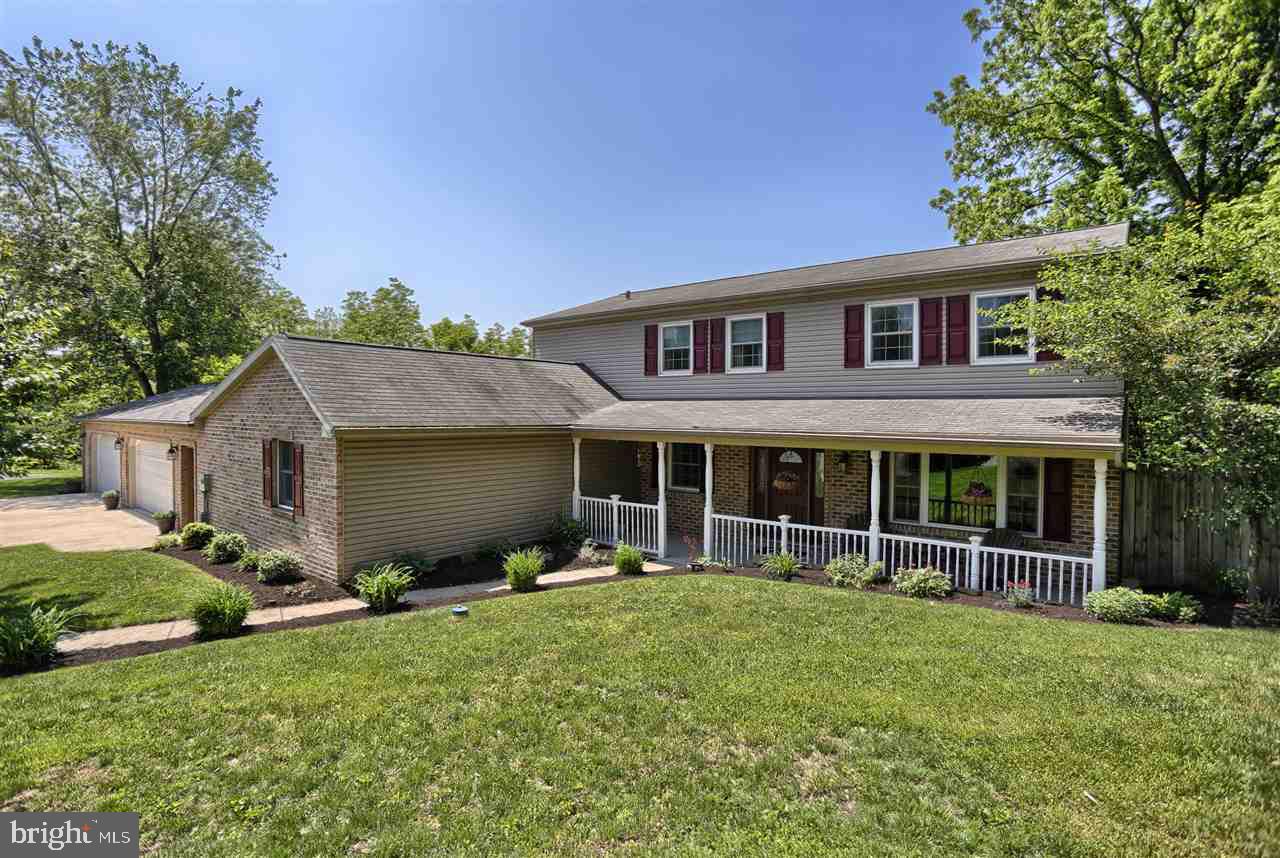 ENTERTAINERS DREAM HOME! Completely Updated. The most beautiful private setting! 4 BR, 2.5 BA home feat EXQUISITE updated cook's kit w/granite, SS appl, TONS of cabinets & countertop space, & cute corner eating area. 4 Car Garage. Old gar converted to a game rm w/nice bar area & plenty of rm for pool table & media area. Craftsman like covered porch overlooking INGROUND POOL, OVERSIZED pool house w/hot tub, & shed that can be converted to pool bar. Lots of hardscape! Deck overlooks private wooded lot.