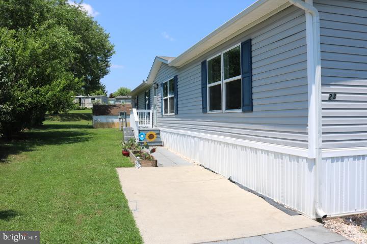 Welcome home to this well maintained 4-bedroom, 2-bath mobile home offering the perfect blend of space and functionality. Ideal for growing families or those seeking extra room for a home office or hobby space, this home features an open-concept living area, a large kitchen with plenty of cabinet space, and a dedicated dining area.
The primary suite includes a private bathroom and walk-in closet, while three additional bedrooms provide flexibility for guests, children, or work-from-home setups.
Enjoy central heating and cooling, laundry hookups, and a spacious layout that makes everyday living comfortable and efficient. Outside, there’s room for parking, a large yard, and space to add a deck or garden if desired.
Located in a quiet, friendly community close to schools, shopping, and major highways — this home is move-in ready! Buyer must be park approved.
Buyers agent will need to verify taxes.