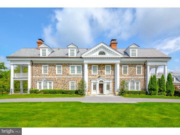 A magnificent Devon, Main Line estate on 3.5 private acres. This 13,000 SF home with 5 bedroom,5 full baths, 3 powder rooms is the perfect blend of old world fieldstone craftsmanship coupled with an completely brand new interior renovation w/state of the art smart home technology, beautiful architectural details, wonderful amenities & great flow for comfortable family living as well as grand scale entertaining. Bright and elegant w/9' ceilings high-end appointments; vaulted ceilings; chef's kitchen with custom cabinetry, radiant heated flooring, Wolf & Sub Zero appliances, full walk in pantry; wall of windows great room; stunning living and dining rooms; his and hers offices; dramatic master suite w/ fireplace, sitting room, walk in dressing room, stylish bath w/double vanities; home theater; exercise room, customized mudroom, 4 car heated garage. Private, tranquil grounds with heated swimming pool & spa, outdoor slate patios, recreation barn w/sports court and a private guest suite with first floor master.