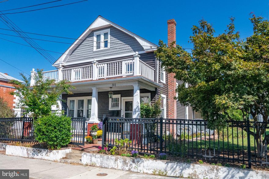 Welcome to this one-of-a-kind home, fondly called the Dawson House,  where historic details meet modern conveniences in the heart of charming Brunswick. The front of the home features many original details from 1900 including an incredible front porch, a foyer with gorgeous staircase, a front formal parlor/living room with built-in cabinetry, brick decorative fireplace with oak mantel and exquisite oak tapered columns flanking both entrances. The living room leads in to a study with more built-ins and double French doors which in turn into the spacious formal dining room. In 2009, a new two-story addition to the original home was built featuring a new kitchen featuring a propane gas range and stainless steel appliances which opens up to the family room with soaring double ceiling height. Also on this level is large full bathroom and practical mudroom off the patio entrance in the back. Go upstairs to the loft and you have a great vantage point of the kitchen and living room, and you can look out through the oversized window to see the lush backyard. Three bedrooms with original charm and decorative wood details can be found upstairs, as well as large full bath. One more set of stairs takes you to the finished attic that includes the 4th bedroom and additional bonus room.  Meticulously maintained and updated: **FRESHLY PAINTED, NEW LVP FLOORING IN ROOMS UPSTAIRS, NEW CARPET RUNNERS 2025**NEW SIDING, NEW SHED, NEW OIL TANK, NEW ELECTRIC DOG FENCE, NEW REFRIGERATOR in 2024** NEW FENCE 2023**NEW ROOF 2020**NEW APPLIANCES 2019**   This property is turn-key with all the charm of yesteryear and an amazing location on one of the prettiest one-way streets in downtown Brunswick, walkable to the quaint restaurants, bakeries, and Smoketown Brewery. Walk to the MARC station for easy commuting to MoCo and DC. Walk or bike on the scenic C&O Canal along the Potomac River to Harpers Ferry and points beyond. You will LOVE living here! This property is also listed for rent. MLS#  MDFR2073008
