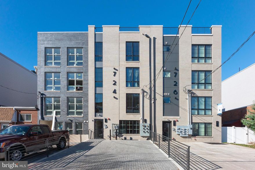 Welcome to Seven Twenty Four -- A collection of 4 residences in a boutique condominium building located in prime Francisville location brought to you by premier Philadelphia developer, Stamm Development Group.  2 units are pre-sold, only 2 remain! This first floor plus finished lower level unit is comprised of 3 BR's/3 BA's in just under 1800 SF of fabulous bi-level living. The detailed brick paver entrance opens to a spacious open-concept living with living room, dining and chef's eat-in kitchen including high-end GE stainless steel appliance package, white shaker cabinetry, white quartz countertops including island with waterfall and carrara marble backsplash and Kohler Purist fixtures. Sliding glass doors lead to your enclosed private patio great for entertaining and dog lovers. Master suite oasis is located down the extra wide hallway with spacious Master BR with walk-in closet with custom built-ins.  Large en-suite bathroom with step-in shower with custom matte black mullion shower doors and double vanity with Carrara countertop and Kohler Purist plumbing fixtures throughout. Lower level features 2 guest suites each with walk-in closets with custom built-ins, laundry room with washer/dryer as well as flexible open space ideal for home gym/office/playroom/media room. Home is wired with speakers, AIPHONE security systems and a Sonos Amp as well as Gypcrete and additional sound demising insulation installed for noise cancellation between each floor. Easy access to Center City, transportation and major highways.  Incredible location just steps from Fairmount Avenue. 10 year property tax abatement.