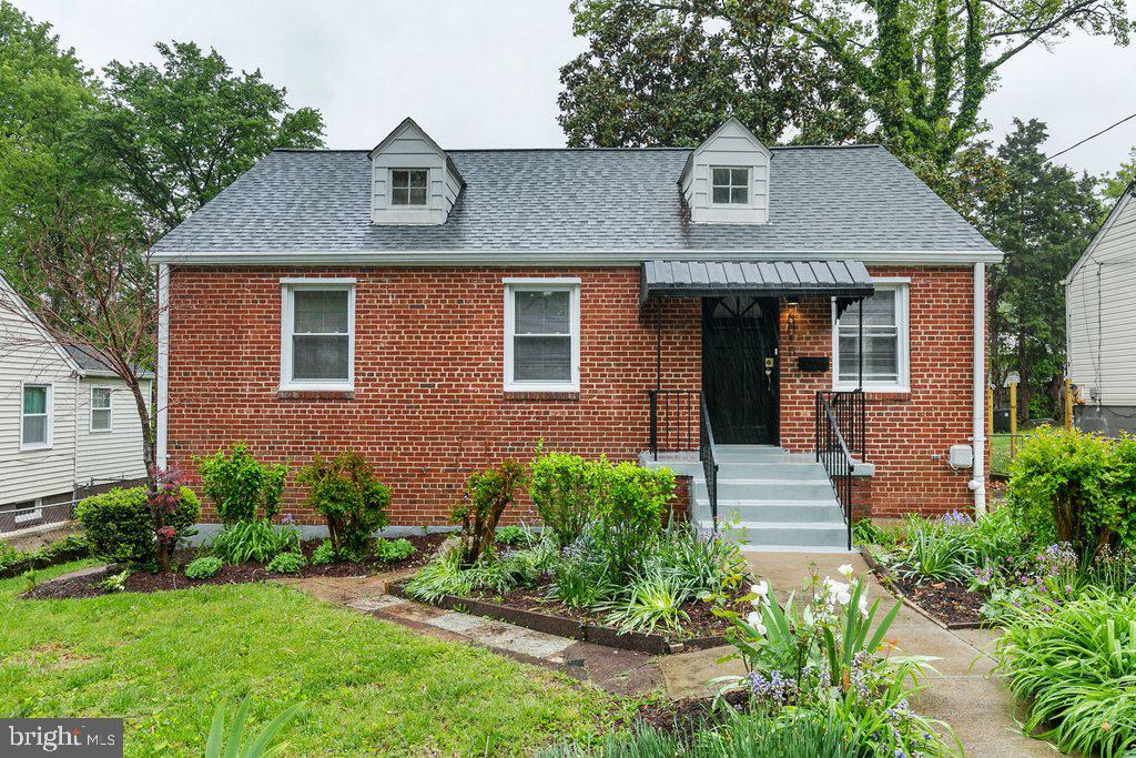 Absolutely Amazing Cape Cod style house in the beautiful city of Hyattsville! Brand new kitchen with custom cabinets, stainless steel appliances, luxurious quartz countertop, freshly painted all throughout, remodeled bathrooms, fixtures, refinished solid wood floors all throughout main floor, the walk out basement is finished with tile. 3 well sized bedrooms share 1 full bathroom on the main level with a large living room boasting vaulted ceiling, designated dining area that opens to the backyard patio. In addition to the bedroom and full bathroom, the walkout lower level offers many flexible spaces: potential for another bedroom, home office or gym. Stunning level yard with handsome shed, pergola and patio. Walk to 2 metro, bus stop, shopping and places of worship. Enjoy the newly built middle school and public library nearby. Superb location minutes drive to the DC line!