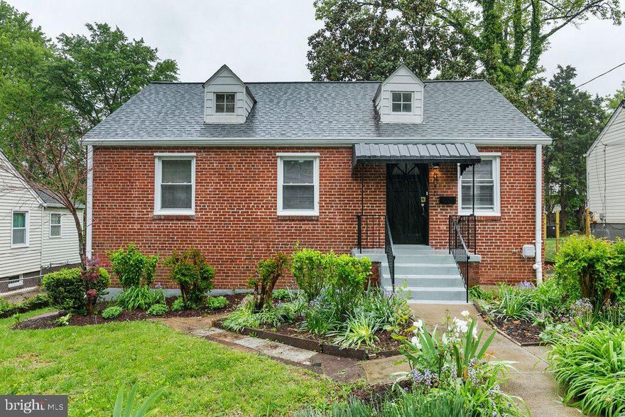 Absolutely Amazing Cape Cod style house in the beautiful city of Hyattsville! Brand new kitchen with custom cabinets, stainless steel  appliances, luxurious quartz countertop, freshly painted all throughout, remodeled bathrooms, fixtures, refinished solid wood floors all throughout main floor, the walk out basement is finished with tile. 3 well sized bedrooms share 1 full bathroom on the main level with a large living room boasting vaulted ceiling, designated dining area that opens to the backyard patio. In addition to the bedroom and full bathroom, the walkout lower level offers many flexible spaces: potential for another bedroom, home office or gym. Stunning level yard with handsome shed, pergola and patio. Walk to 2 metro, bus stop, shopping and places of worship. Enjoy the newly built middle school and public library nearby. Superb location minutes drive to the DC line!