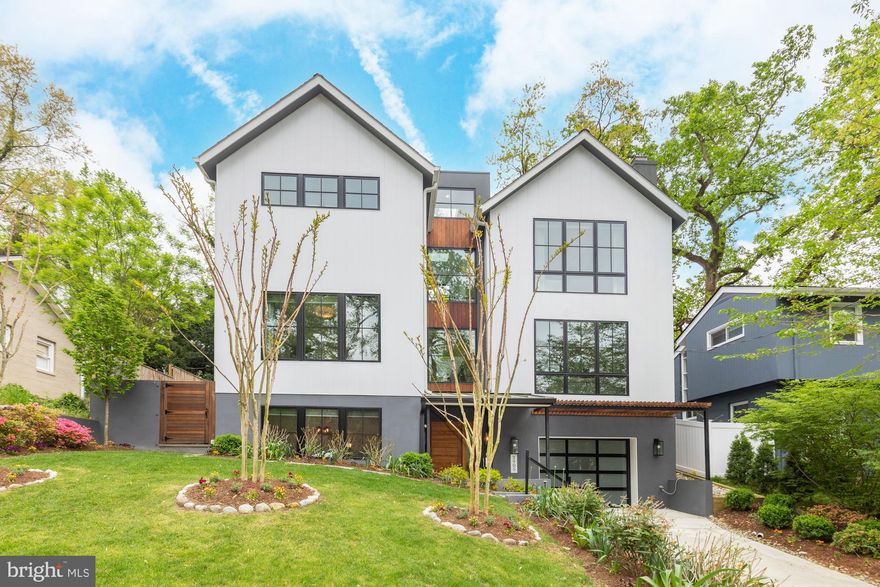Welcome to 2905 Arizona Ave. NW.  This stunning five-bedroom, three full bath plus two half bath home was built in 2020.    When you step inside you will discover an open and airy interior that effortlessly blends warmth with comfort.  The combination of beautiful woods,  contemporary design and oversized windows that frame the most beautiful trees will captivate you. 

The heart of the home is the gorgeous chef's kitchen, a culinary masterpiece that will inspire your inner chef and delight your guests.  With too many features to list, we promise it won't disappoint.  The kitchen looks onto the a dreamy patio with an outdoor grilling station and fridge, perfect for entertaining and enjoying beautifully landscaped surroundings, 

The primary suite is a true retreat, offering a level of luxury that goes beyond expectations.  With spacious dimensions, a drool-worthy walk-in closet, gorgeous bath with dual sinks, separate W/C, soaking tub and luxurious shower.  It's a sanctuary to unwind in style.  Additionally, this home features a breathtaking terrace perched high to practice your yoga or drink of glass of wine.  

The oversized garage features an electric charger catering to the needs of modern convenience and sustainability and enough room to store bikes, golf clubs, etc.

This home is an embodiment of modern elegance and timeless appeal, offering a lifestyle of sophistication and relaxation.   Don't miss the opportunity to make this extraordinary property your own.