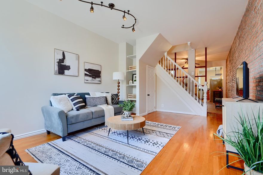 Hey Hon! Are you looking for a great new place to call home on an amazing block in Hampden? Come take a tour of 806 W. 35th St. Just 1 block south of The Avenue!

This well maintained home has been delightfully updated and is ready for its next owner. This home features 3 upper bedrooms and 1 full bathroom upstairs all with plenty of natural light. Each bedroom has at least 1 large window to bring in the sunshine! The primary bedroom soars to a ceiling height around 15 feet! It has plenty of closet space and room for all your furniture. The tree out front provides lovely greenery and shade through most of the year. Both the primary and bedroom 2 have bamboo flooring throughout. 

The full bathroom is convenient just down the hall and splits up bedrooms 2 and 3 toward the rear of the home. It offers upgraded tile and a full size window as well to brighten your morning cleaning rituals. The rear bedroom overlooks your rear patio and newly installed crushed stone parking pad. 

Coming downstairs you’ll love passing the original 2x4 studded wall that adds to the charm of your new home. The living room is to the front of your home and features hardwoods and 2 tall windows as well as a transom window over your front door. Hardwood adds to the warmth of this room and you’ll love having a real coat closet and open shelving nooks for storage. They’re a great place to keep games for entertaining groups of friends when they visit. 

You’ll pass through the open dining room on your way to the kitchen for breakfast. You can throw your towels right into the laundry and be finished that cleaning right away. The kitchen is well laid out and many of the lower cabinets feature roll out shelving so it's a snap to get to pots and pans or small kitchen appliances that you want to tuck away. If you want to show off that pan collection, display it tastefully with the ceiling mounted pot hanger- right over your large prep island. Enjoy the full size appliance package with over the range microwave, dishwasher, gas stove and full size fridge. Walk out your back door to your parked car and head out to work for the day. 

Enjoy everything that Hampden offers within a short walk. There are so many great restaurants and breweries and quirky fun art stores to spend hours in. Wyman Park offers plenty of green space or bike over to Johns Hopkins campus and the Baltimore Art Museum. Take out of towners to the Maryland Zoo just 5 minutes away. Access to Rt 83 makes commuting downtown or out of the city a breeze. Don’t miss this great opportunity to own a part of amazing Hampden.