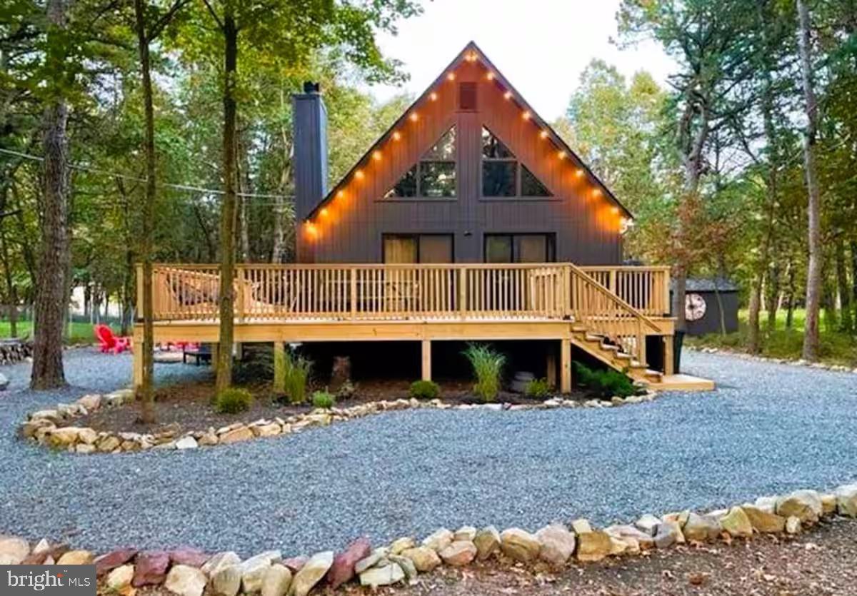 Modern 3-Bedroom Chalet in Emerald Lakes – Stylish & Serene Short Term Rental Retreat
Welcome to your dream getaway in the heart of Emerald Lakes! This beautifully updated 3-bedroom, 1.5-bath modern chalet blends rustic charm with contemporary finishes. Featuring rich dark wood accents and striking architecture, this home offers the perfect blend of comfort and sophistication.
Step inside to a bright and inviting open-concept interior with sleek vinyl laminate wood-look flooring and large windows that bathe the space in natural light. The modern kitchen is outfitted with stainless steel appliances, clean lines, and ample counter space—ideal for everyday living and entertaining.
Whether you’re enjoying the serene woodland setting from the deck or cozying up inside, this home is perfect as a year-round residence, weekend escape, or investment property. Located in the desirable Emerald Lakes community with access to lakes, pools, and other amenities.
Features:
3 Bedrooms / 1.5 Bathrooms
Modern kitchen with stainless steel appliances
Vinyl laminate wood-look flooring throughout
Dark wood exterior with contemporary flair
Access to community lakes, pools, and more
Don’t miss this unique opportunity to own a fully furnished turnkey short term rental chalet in one of the Poconos’ most sought-after communities!