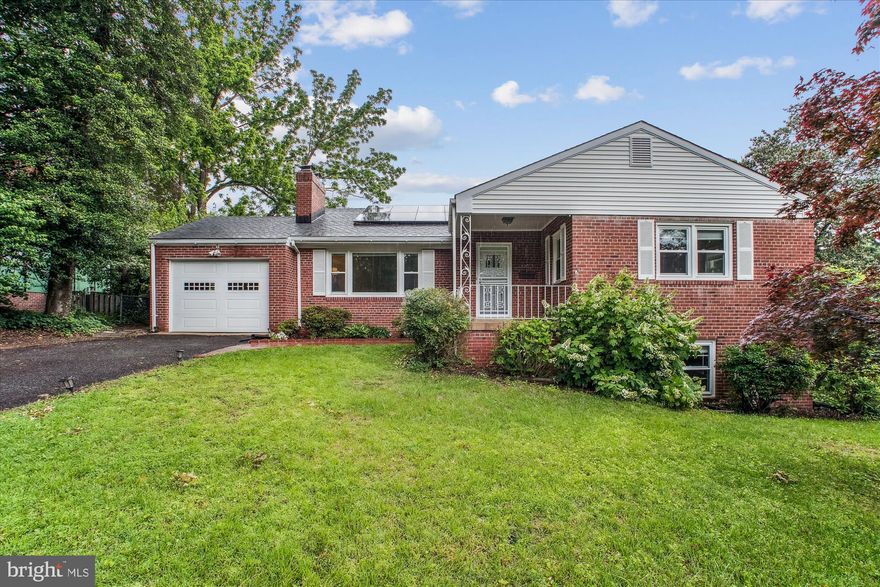 Beautiful l 4-bedroom (3 are located on the mail level), 3-bathroom home located on a quiet Cul-de-sac in desirable Sleepy Hollow Neighborhood! This updated home features kitchen (renovated in 2020) with white granite, white cabinets, high end appliances and skylight. New Electrical Panel, energy efficient, fully paid-off solar panels, installed in 2021, with electricity cost under $15/month (saves over $200/month which can be used for Mortgage payment).  The roof was replaced in 2018. A spectacular sunroom addition highlights a cathedral ceiling with lots of windows that flood the space with natural light and offer views of the spacious, fenced backyard. The sunroom has both heating & cooling Mini Split unit, and a gas furnace heater. Glass French doors from the dining area, wood floors and exposed brick with rustic wood paneling. Walk-in finished lower level includes two large recreation rooms, a fourth bedroom and full bath with walk-out access to the fabulous yard with fruit trees and enough space to create your own oasis.
Attached one car garage. Close to shops, dining & public transportation! No HOA. Move-in ready! Don't miss it!