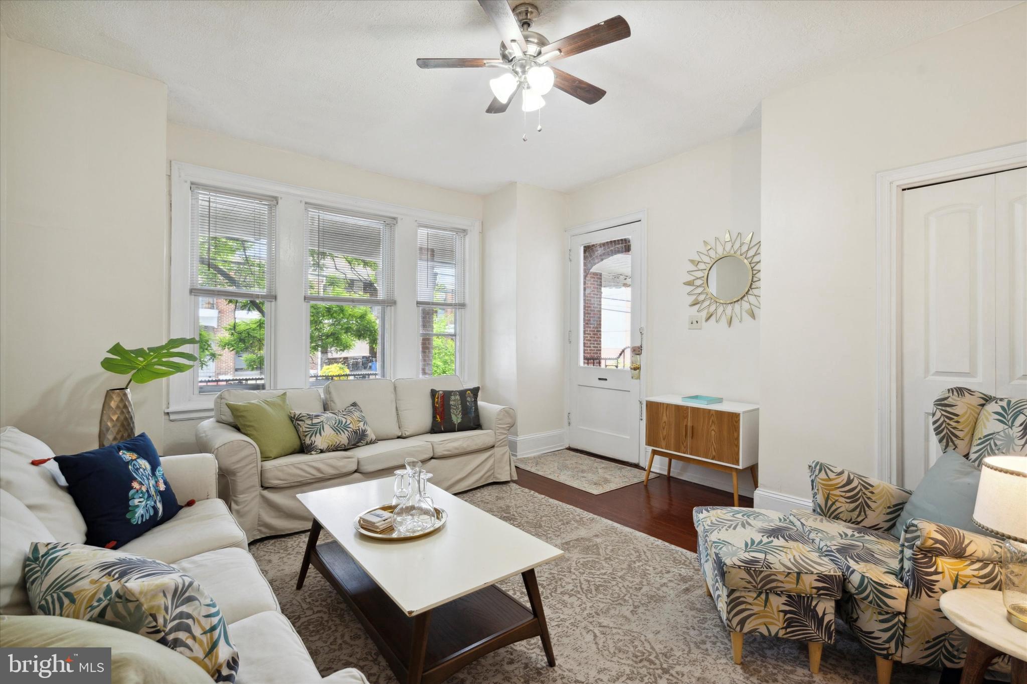 Available now! Gorgeous and spacious 1st floor apartment located near University City. This stunning apartment features a sun-filled living room, 3 bedrooms, formal dining room, centrally located renovated hall bath and updated kitchen. Additional features include refinished original hardwood floors, ceiling fans throughout, in-unit washer and dryer and large front porch. This location is close to shopping, cafe, banks and restaurants. Pictures are from when the property was staged a couple years ago. Unit is currently vacant and unfurnished.