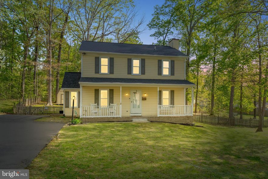 Tucked away on over half an acre in sought-after Holleybrooke, this private 3-bedroom Colonial is surrounded by mature trees and loaded with charm. The main level was freshly painted in 2024, a brand new roof was just installed in April 2025, new dishwasher installed April 2025. Inside, you'll find tasteful updates throughout, including new kitchen finishes and backsplash, ceiling light fixtures,  and other modern touches that make this home truly move-in ready. The expansive primary suite features a generous walk-in close along with an en-suite dual vanity bathroom. An inviting front porch gives  instant curb appeal, while the fully fenced backyard offers space for pets, play, and outdoor living. A rare opportunity for privacy, style, and location.
