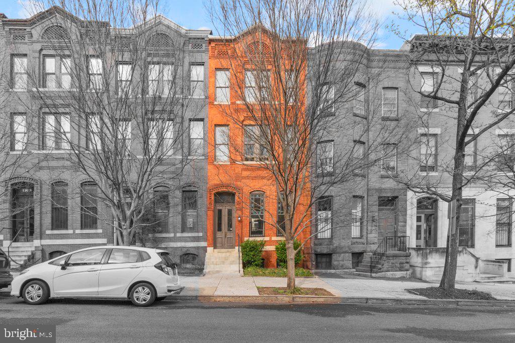 ● 3 Apartments in Baltimore’s Coveted Bolton Hill Neighborhood
● 1.5 Blocks to Reservoir Square, an 8-Acre $100 Million Development w/ New Housing & New Grocery Store
● 5 Blocks to MICA (3rd Highest Rated Art School in the Country), A Big Generator of Tenants
● Built to Last: Copper Plumbing, PVC Drain Lines, and a 5-Year-Old Mineral Felt Roof Reduce CapEx Risk. This Bolton Hill triplex includes a spacious 3-bedroom, 2-bath unit on the main and lower levels, along with two one-bedroom apartments above. The first unit features an open-concept kitchen and living area with durable laminate flooring, ideal for rental durability and easy maintenance. The kitchen is well-equipped with Silestone counters—known for their stain and scratch resistance—wood shaker cabinets, a 30″ gas range, dishwasher, disposal, and a full-size washer and dryer. Both full baths offer modern vanities and ceramic tile tub surrounds. The first-floor bedroom is accented with stained glass windows for a pop of historic charm. Downstairs, the lower level includes a terrace-level walkout to a poured concrete patio surrounded by lush landscaping with liriope, offering tenants private outdoor space that’s both low-maintenance and visually appealing.
Upstairs, Apartments 2 and 3 feature original hardwood floors in the living areas and similar layouts, each with east-facing bedrooms that capture beautiful morning light—an often underrated feature that tenants love for natural warmth and energy. Kitchens include wood cabinetry, 20″ or 30″ gas ranges, and either porcelain or laminate countertops, while baths offer steel tubs with fiberglass or ceramic tile surrounds. A shared washer and dryer serve these upper units.
The current lease for Apartment 2 expires on 7/3/2025, with a current rent of $1,125/month. A new lease begins on 7/7/2025, with a future rent of $1,295. The property is separately metered with four electric meters and four gas meters, allowing tenants to pay their own gas and electric costs directly to the utility provider. The landlord currently covers water service, though a savvy operator could implement a RUBS or submetering system to recapture that expense and boost cash flow.
Apartment 1 is equipped with a gas-fired Goodman furnace, central air conditioning, and its own electric water heater. Apartments 2 and 3 each have their own rooftop winter/summer HVAC units providing both heat and central air. Apartments 2 and 3 each have their own rooftop winter/summer HVAC units that provide both heat and central air. These two units share a gas-fired water heater, and the landlord currently pays for the gas that fuels it. The building features a copper main water service line, copper interior supply lines, and PVC drain lines. The roof is a 5-year-old 90# mineral felt system, providing reliable protection and minimal near-term maintenance needs. The property’s proximity to MICA—where on-campus housing is limited—makes it especially attractive to student tenants. The college also draws international educators and administrative professionals, further boosting rental demand. Bolton Hill is a quiet, tree-lined neighborhood in West Baltimore, celebrated for its historic architecture and central location. Access to I-83, Martin Luther King Jr. Boulevard, and multiple Light Rail stops makes commuting to downtown, Midtown, and points north or south seamless. With more than 73% of neighborhood residents renting, this well-maintained, fully leased triplex is a strong long-term hold in a stable, appreciating submarket.
Just a block and a half from the $100 million Reservoir Square redevelopment, 1705 Bolton stands to benefit from the retail, amenities, and foot traffic the project will bring—including a major grocery store. Already in high demand, Bolton Hill is poised to become even more desirable for renters seeking charm, convenience, and walkability.