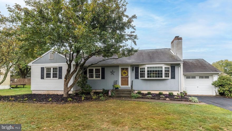 Welcome to 52 Evergreen Dr, a charming home located in New Britain Boro offering a perfect blend of comfort and functionality. This home features a spacious living room with hardwood floors, a cozy wood-burning fireplace, and a large bay window that fills the space with natural light. The large dining room includes built-in cupboards, perfect for extra storage. The kitchen has been thoughtfully improved with solid wood cabinets with rebuilt interiors, including pull-out drawers. It boasts luxury vinyl plank floors, granite countertops, under-cabinet lighting, a Dacor wall oven, and modern pendant lighting.
The primary bedroom offers two closets, including a deep cedar closet, hardwood floors, and a ceiling fan. Two additional bedrooms, one currently used as an office, both feature ceiling fans and hardwood floors. The full bathroom has been updated with a jetted tub, custom subway tile, and ample storage, including a huge linen closet. The basement is partially finished with LVP floors, has cast iron radiators, and a full bath.  Outside, enjoy a large deck (24x12) with pergola and electrical outlets, a patio with a fire pit, and a beautiful, well-maintained yard.  Additional features include a garage with a 220-line and extra storage space, an attic with ample storage, and the convenience of a shed, making this home as practical as it is beautiful.  Convenient location only steps from Delaware Valley College, downtown Doylestown, shopping and restaurants.  Don’t miss the chance to make this delightful home yours!