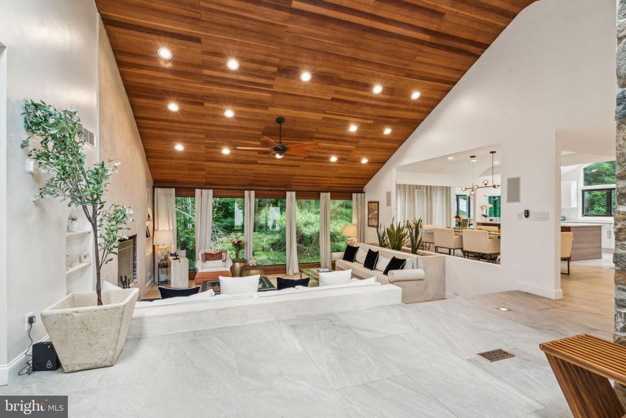 Presenting 1220 Valley Rd, nestled in Villanova's esteemed estate section, where panoramic views and complete privacy create an unparalleled living experience. This newly renovated  mid-century modern home is located within the renowned Lower Merion School District, epitomizing luxurious living.
With 6 bedrooms and 7 bathrooms, this residence boasts an open floor plan designed for modern living.
Upon entering the home, you're welcomed by soaring ceilings adorned with wood accents, infusing the space with warmth and sophistication. Oversized picture windows frame the scenic backyard, flooding every room with natural light and tranquility.
The gourmet kitchen, featuring an oversized island, seamlessly connects to the dining and sunken living areas, complete with built-in banquettes—perfect for entertaining or intimate family gatherings.
Imagine hosting unforgettable brunches and dinners in the open and airy kitchen, equipped with quartz countertops and high-end stainless steel appliances—a setting designed for cherished moments with loved ones.
But the allure doesn't stop there! This home offers additional entertainment space, including a private bar and a movie theater, elevating every gathering to new heights of luxury.
Now, let's talk relaxation. The primary owner's suite is a personal sanctuary, boasting an oversized walk-in closet, a spacious walk-in shower with marble accents, and a separate soaking tub with access to the back deck -true haven within your own home.
Upstairs, discover a generously sized in-law suite, newly renovated for comfort and privacy. Downstairs, three more spacious bedrooms with en suite bathrooms offer access to a second movie theater/family room space.
And the delights continue! An attached charming one-bedroom guest quarter, complete with its own living room and kitchen, provides the perfect retreat for visitors or live-in relatives.
Step outside onto the  back deck for breathtaking valley views, or head to the front where endless possibilities await—from enjoying nature's beauty to friendly basketball games on the custom court, Fire Pit and much more.
This home boasts an ideal location close to shops, restaurants, and public transportation, ensuring convenient living and easy access to everything the surrounding areas have to offer.