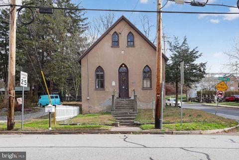 Photo of 646 Manatawny Street, POTTSTOWN, PA 19464 (MLS # PAMC2161506)