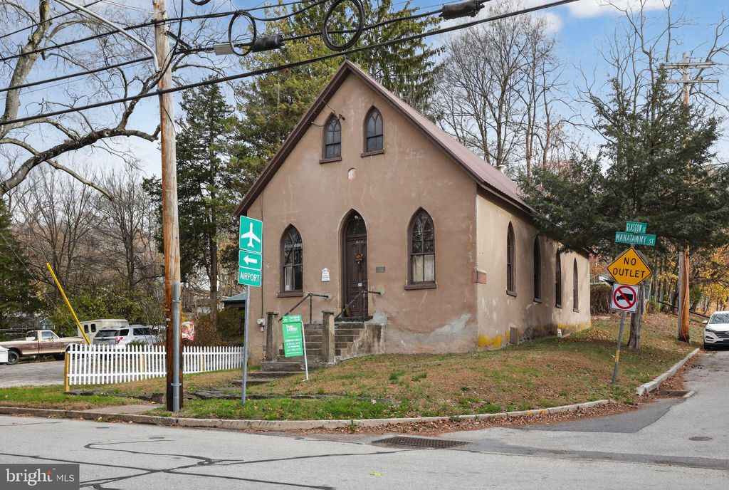 Photo of 646 Manatawny Street, POTTSTOWN, PA 19464 (MLS # PAMC2161506)