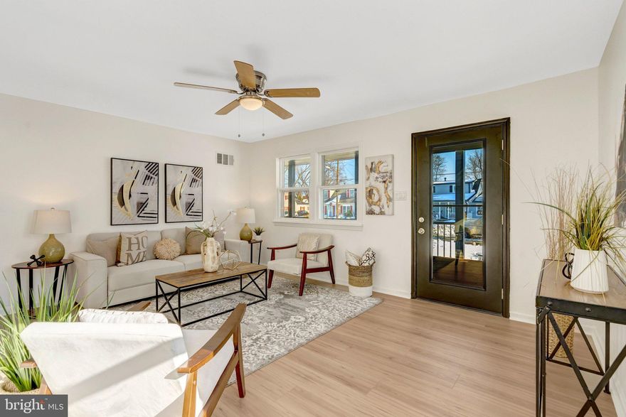 ** Stop the Car!** Main Level Living** Welcome to this beautifully remodeled two-story single-family home.  Step onto the inviting front porch, the perfect spot to enjoy morning coffee, unwind in the evenings, or greet neighbors as they pass by. The porch features composite decking, offering the beauty of wood without the upkeep.  Enter through the front door into the spacious light and bright living area.  You'll find 2 secondary bedrooms on the main level, along with 2 full bathrooms, thoughtfully renovated with modern finishes.  At the center of the home is a brand-new kitchen showcasing new cabinetry, new Frigidaire SS appliances, quartz countertops, subway tile backsplash and an improved layout designed for everyday functionality.  You'll also find the laundry area (front load washer and dryer) on the main level.  The upper level features a comfortable retreat; primary suite complete with a dressing area, and quaint window seat.  You'll find a reading nook and additional storage to keep things organized.  A secondary spacious bedroom with sitting area creates the perfect spot to unwind with a book, work from home, or enjoy a quiet moment.
Enjoy outdoor living, alfresco dining and entertaining on a beautiful hardscape patio, and a large backyard enclosed by new black chain-link fencing. The property also offers the convenience of driveway parking and space for multiple cars. 
Located just minutes from major commuter routes, shopping, the community center, water park, public library, and VRE, this home offers comfort, style, and an unbeatable location.  This is THE ONE you've been waiting for! (Shed As-is)