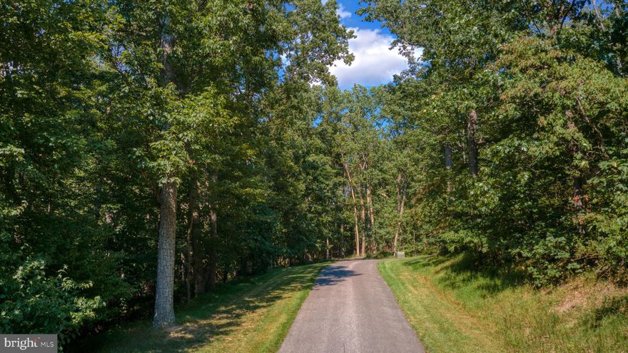 Wonderful opportunity!! Tranquil park like setting.  Private lot with gorgeous scenic views with well and approved perk  Six plus acres located just minutes from shopping, restaurants , schools and major commuter routes.  If you're looking for a place to build your dream home you don't have to look any further! To view the property you must be accompanied with a  licensed agent.  Don't miss your opportunity to own this property and build  your unique homestead.