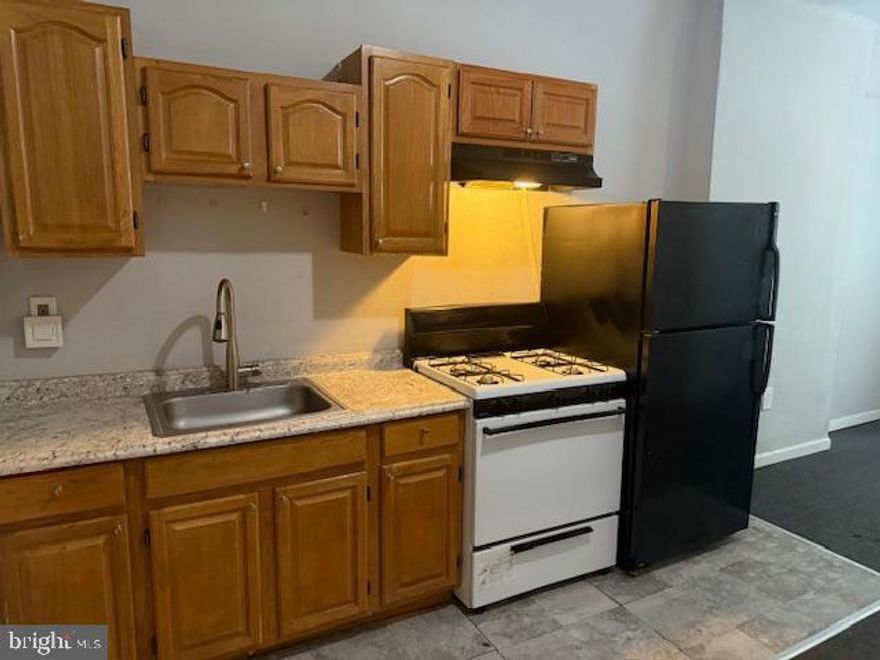 Available now at 2739 Wharton Street we have a simple, updated one-bedroom apartment for rent. The apartment stretches the length of the house on the first floor. There is a front living room area connected to a full bathroom with tub. The kitchen is equipped with a fridge, gas stove, and plenty of cabinet space. The kitchen separates the living area from the back bedroom. The bedroom has a door leading to a private backyard area. The pictures do not do justice. See it for yourself while the apartment remains available. Public transportation is easily accessible. Short walk to the Fresh Grocer of Grays Ferry shopping plaza. Pets negotiable.