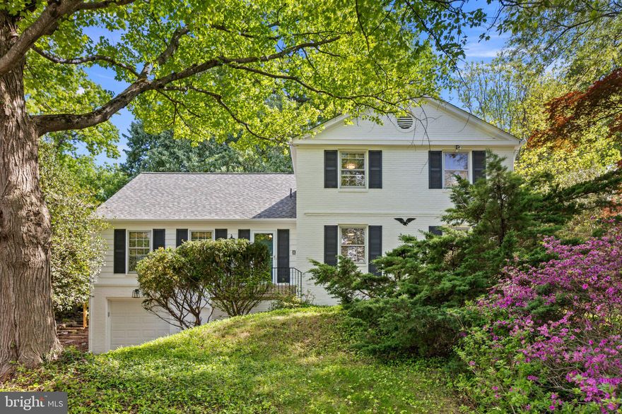 OPEN SAT & SUN 1-3PM! Set within sought-after Old Farm, this standout brick colonial has been renovated from top to bottom. Enjoy refinished hardwood floors, new paint, and updated lighting throughout. Timeless character blends with tasteful updates to create a fresh, cohesive feel. Enter to a sunny, spacious foyer. The main level includes a large formal living room and comfy family room. The family room boasts a fireplace with handsome brick mantle and new sliding doors that open to a brick patio for easy indoor-outdoor living. The backyard is your private retreat with native plantings and seasonal blooms, including vibrant azaleas in the spring. The spacious kitchen includes granite countertops, a huge pantry, a new dishwasher, and a bright breakfast nook overlooking the yard. The formal dining room with large windows and designer lighting is ideal for entertaining. Flexibility abounds with a main-level bedroom and full bath, plus a dedicated laundry room with abundant storage. Upstairs, you'll find four additional bedrooms and two renovated bathrooms. The expansive primary suite includes a walk-in closet, attic eave storage, and a versatile bonus room—the perfect space for a home office, gym, nursery, study, or dressing room. The finished lower level, accessible from the garage, offers a secondary entry/mudroom alongside a versatile rec room with a half bath. The basement has new LVP flooring and a new French drain tied into a sump rough-in for added peace of mind. There's even a HALO whole-house water filtration system. The Old Farm neighborhood is known for its convenient location and year-round community events, including a 4th of July parade, summer picnic, and winter party. Residents enjoy two community pools (membership required) and nearby Tilden Woods Park. The location offers quick access to I-495 and I-270, Park Potomac, Pike & Rose, Cabin John Shopping Center, and Downtown Bethesda.