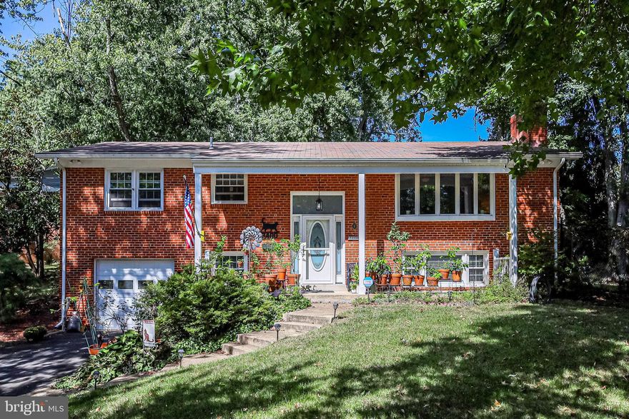 Welcome home! Pull into the driveway and you’ll marvel at the generously sized yard this 4 bedroom, 3 bathroom home provides. Walking through the front door, you’ll instantly love the feeling of this bright and open split foyer. With hardwood floors and large windows throughout the upper level, the ambiance is fresh and clean. Up the stairs, you can curl up by the fireplace in your family room. Continue into the house and you’ll discover the beautifully updated modern kitchen with cherry cabinets, corian countertops, and stainless steel appliances. The spacious dining room is big enough to host small dinner parties and large family gatherings alike. Down the hall, the primary bedroom awaits you with ample closet space. A renovated full bathroom with walk-in shower and sophisticated tiling is attached. Two bedrooms and a roomy full bathroom complete this level. Down the stairs, you’ll find a fourth bedroom as well as a third full bathroom with a walk-in shower, making it an ideal private space. The rec room is a fantastic second living space, filled with natural lighting and an additional fireplace. This level also features an expansive laundry and storage room. Step outside onto your deck and enjoy the flat fenced yard. With lots of tree cover for shade and privacy, this sizable back yard is perfect for both relaxing and entertaining. Cats ok. Minutes to Aldi, Costco, Wegmans, Walmart, Fort Belvoir, Mount Vernon, Kingstowne, National Harbor, Huntley Meadows Park, Fort Hunt Park, and the Potomac River. Quick access to Rte 1, Mt Vernon Hwy, I-95, and the Capital Beltway. Come check out your new home today! Sorry, No dogs.