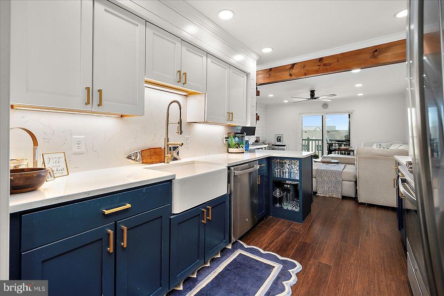 Discover the perfect blend of style, comfort, and true waterfront living in this beautifully updated 2-bedroom, 2-bath condo on 94th Street. Offering 1,025 sq ft of thoughtfully designed space, this home invites you to step right out your back door to the canal—perfect for boaters and anyone who loves life on the water. Enjoy stunning sunset views from your spacious back deck, ideal for relaxing or entertaining. Inside, the open concept living area and modern kitchen feature tasteful updates and contemporary finishes throughout. With low condo fees, a completed reserve study, and no special assessments, this is a stress-free waterfront opportunity you don’t want to miss.