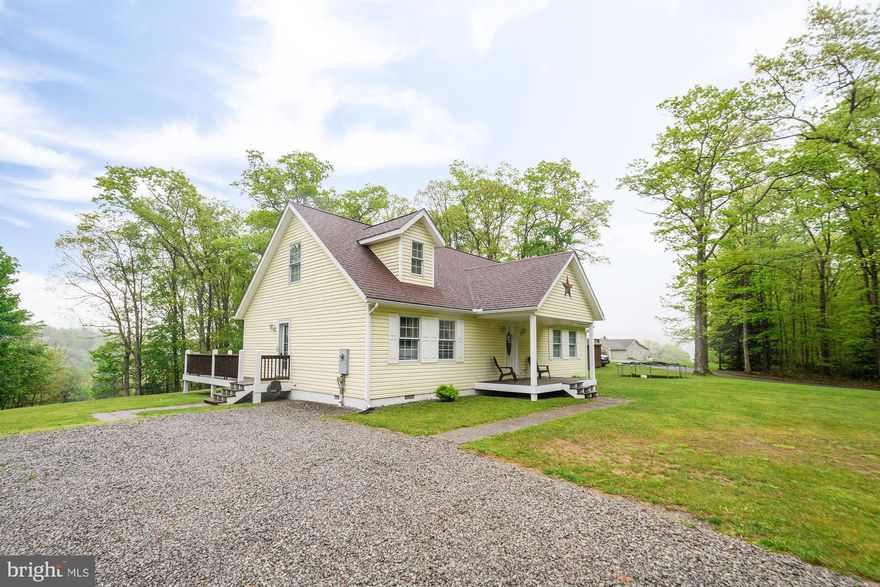 Check out this immaculately maintained affordably priced home before it's gone! 723 Burnside Camp Rd is a four bedroom three full bathroom home that feels warm and inviting from the moment you enter. Located on the MD/WV State line, you're close to Swallow Falls State Park, Herrington Manor State Park, Deep Creek Lake, and other area attractions. Constructed in 2009 this home boasts central A/C and forced air heating. The main level has potential for single level living with a primary bedroom with a walk in closet and large bath, laundry, and additional full bath and bedroom. The combination kitchen/dining room is roomy, situated nicely, and features hickory wood cabinets and a pantry. Two bedrooms,  a potential playroom in the hallway, and additional full bath are on the upper level.  Call today to schedule a showing before this one is gone!