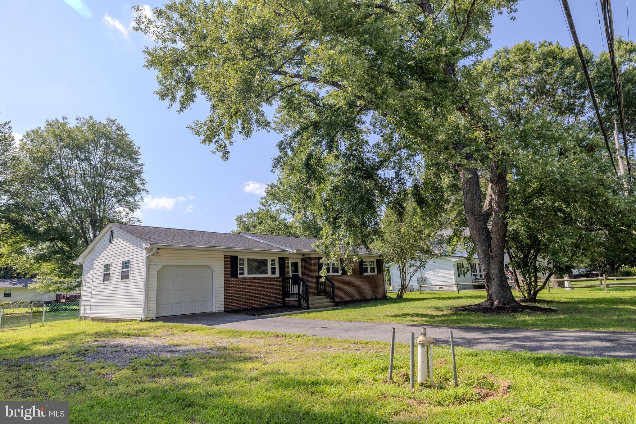 Come get a look at this gem at the open house on 7/26 from 10am to 3pm. This brick front rambler with garage is situated on a spectacular lot! New flooring throughout, new kitchen appliances and countertops. roof and windows are newer. Hurry...this won't last!
