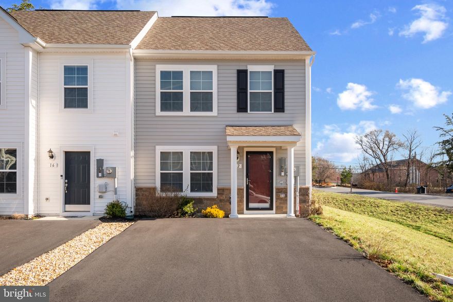 Welcome to 12 Pitch Pine Ct in Bunker Hill, WV – a home that feels brand new! This beautifully designed end-unit townhome offers the perfect combination of modern style and comfortable living. From the grand entrance with its charming front pillars to the spacious kitchen featuring a stunning large island and elegant countertops, every inch of this home exudes sophistication.

Step inside and experience the right-sized layout for easy living, all while enjoying the natural light that floods the space. With a layout designed for both function and style, this home is ready for immediate occupancy—don’t miss out!

This prime location offers the best of both worlds—just 11 minutes from top shopping and dining. Nearby, Orr’s Farmers Market provides fresh, local goods.

Explore the Shenandoah Valley with outdoor activities like hiking, biking, and wildlife watching at Cacapon Resort State Park. Enjoy local arts in Martinsburg or scenic drives through the Valley. Outdoor enthusiasts can access the Appalachian Trail, parks, and nature reserves, while golf lovers will appreciate Locust Golf Course, 10 miles away, and nearby vineyards.

With I-81 minutes away, enjoy a 20-minute commute to Winchester, VA, and easy access to Inwood, Locust Golf Course, and Loudoun County. This area offers a perfect mix of peaceful living and city convenience.

This home is move-in ready today!
