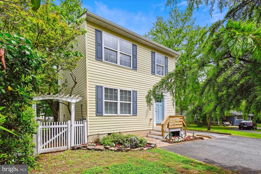 NEW PRICE & OPEN Saturday, 5/31, 11-1!  Welcome to this beautifully maintained 3-bedroom, 2.5-bath home in one of Annapolis’s most amenity-rich waterfront communities. Nestled between Oyster Creek, Fishing Creek, and the Chesapeake Bay, Oyster Harbor offers the best of coastal Maryland living—just minutes from historic downtown Annapolis, top-rated restaurants, shopping, and commuter routes.  This move-in ready home features a long list of updates, including a brand-new roof, new granite countertops, new dishwasher and recent mechanical improvements: a new heat pump and A/C compressor (2024), and new refrigerator, stove, washer, and dryer (2019).  The fully fenced backyard boasts water peeks, a hot tub, and a spacious deck surrounded by beautiful landscaping—ideal for entertaining or quiet evening relaxation.  Inside, the layout includes a welcoming living area, functional kitchen with plenty of cabinet space, and a light-filled dining area. Upstairs, the primary suite includes a private full bath, with two additional bedrooms and a full bath.  But what truly sets this home apart are the amazing resort-style amenities:  private community beach with swimming area and sea nettle nets, three marinas , fishing pier, boat ramp, kayak racks, beach volleyball, and playgrounds!  Whether you’re looking for a full-time residence or a weekend retreat, this home and its community offer something truly special:  a waterfront neighborhood that embraces recreation, relaxation, and the Chesapeake lifestyle.