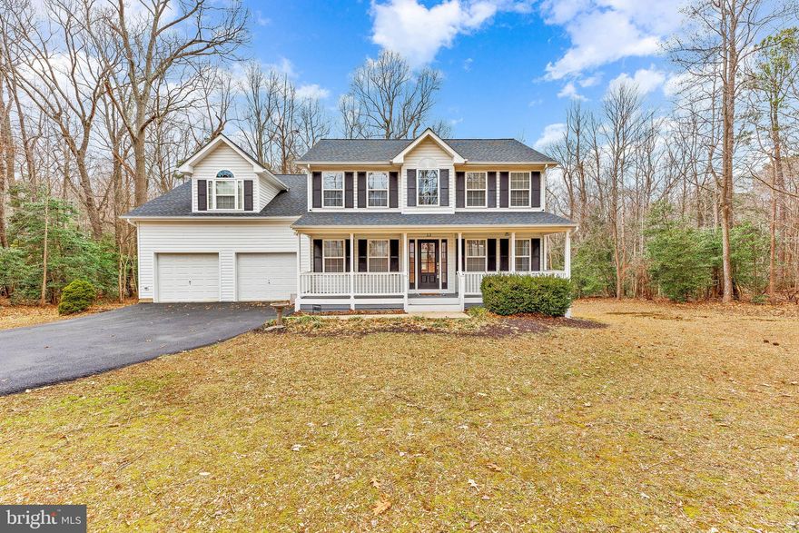Deadline: Highest and best offers must be received by tomorrow, Friday 02/18/22 by 3:30 pm. Currently there are 3 offers in hand.
GORGEOUS!!! This 5 Bedroom 3.5 Bathroom 2800 sqft Colonial w/ a 2-car garage and fully finished basement is a SHOW STOPPER sitting on a 3/4 Acre PRIVATE lot! Driving up you are captivated by the curb appeal of the paved driveway, new architectural roof, recently updated front porch, & custom 3/4 glass craftsman front door! Upon entry you are greeted by gleaming hardwood flooring that flows through both the main floor and second floor. To your right is a good-sized formal living room that would make the perfect office and to your left is the formal dining room w/ access to the kitchen.  The kitchen was remodeled 1 year ago with high quality materials and extreme attention to detail. Quartz Countertops, subway tile backsplash, custom 2 tone shaker style cabinetry, multiple pantry cabinets, & high-end stainless appliances are compiled in an extremely elegant and functional design. Just off the kitchen is a full glass door that provides access to the synthetic deck. To the right you will find the family room, ready for your decor. The updated half bathroom completes this floor. Upstairs you are greeted by a nice hallway which provides access to 3 large bedrooms, an elegantly renovated hall bath, and the primary suite. The hall bathroom is fitted with a subway tiled shower that seamlessly flows from the shower into an accent surrounding the bathroom. Custom fixtures and a tile floor complete this wonderful renovation. The large primary suite has vaulted ceilings, a sitting area, a huge walk-in closet w/ two separate entrances, & an updated primary bathroom. The primary bathroom has updated fixtures, a brand new custom dual sink vanity & luxury vinyl plank tile flooring. The mostly finished basement includes a rec room that can function as 2 separate rooms since it wraps around the staircase, as well as, a bedroom, a full bath, and a large storage/laundry room. Outside a wonderful yard is wrapped with trees giving you great privacy! The back deck & front porch have been updated w/ composite decking and vinyl railings. Notable updates include Kitchen remodeled in 2020, Powder room remodeled in 2016, Upstairs Hall bath remodeled in 2021, New water heater in 2021, New well pump in 2021, Front Porch rebuilt in 2020, Architectural roof in 2019, driveway paved in 2016 and sealed in 2021, Propane line run for a grill on the deck! Don't wait or you will miss this opportunity!!