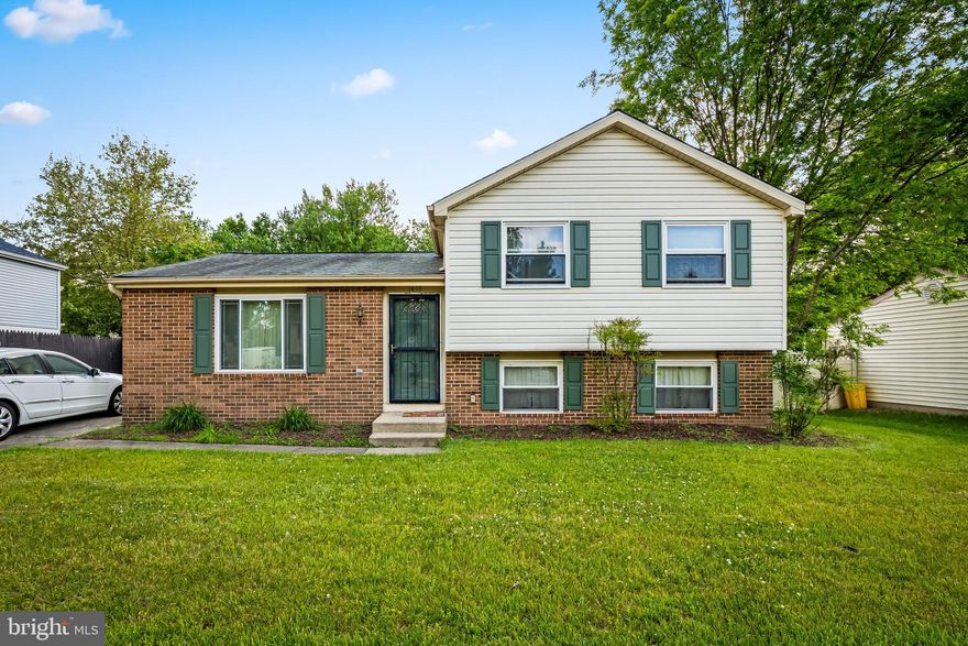This charming split-level home in Harmans Woods offers a perfect blend of comfort and functionality. With 1,600 sq. ft. of living space, this residence features three inviting bedrooms and two and a half bathrooms, ideal for both relaxation and entertaining. The heart of the home is the well-equipped kitchen, complete with a refrigerator, stove, microwave, and dishwasher, making meal prep a breeze. The convenience of an in-home washer and dryer adds to the ease of daily living. Step outside to enjoy the spacious 0.2-acre lot, perfect for outdoor gatherings or quiet evenings under the stars. The partially finished basement provides additional space for a home office, or storage. With a driveway for convenient parking, this home is ready to welcome you. Experience the warmth and comfort of this delightful property, where every detail is designed to enhance your lifestyle. Don't miss the opportunity to make this house your home!