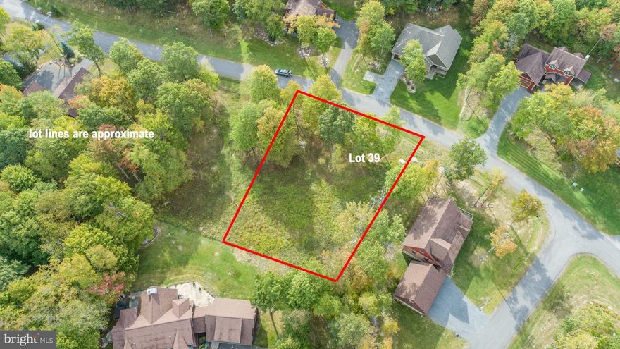 Level building site in the gated Lodestone community atop the mountain at Wisp Resort! This .44-acre lot offers golf course views, paved road access, and an easy build setup with public water and public sewer available. Located minutes from Wisp ski slopes, the ASCI Whitewater Course, Lodestone Golf Course, and the restaurants, shops, and marinas at Deep Creek Lake. The HOA provides road maintenance, snow removal, and private gated access. A clean, build-ready lot with strong proximity to year-round amenities. Call for details!