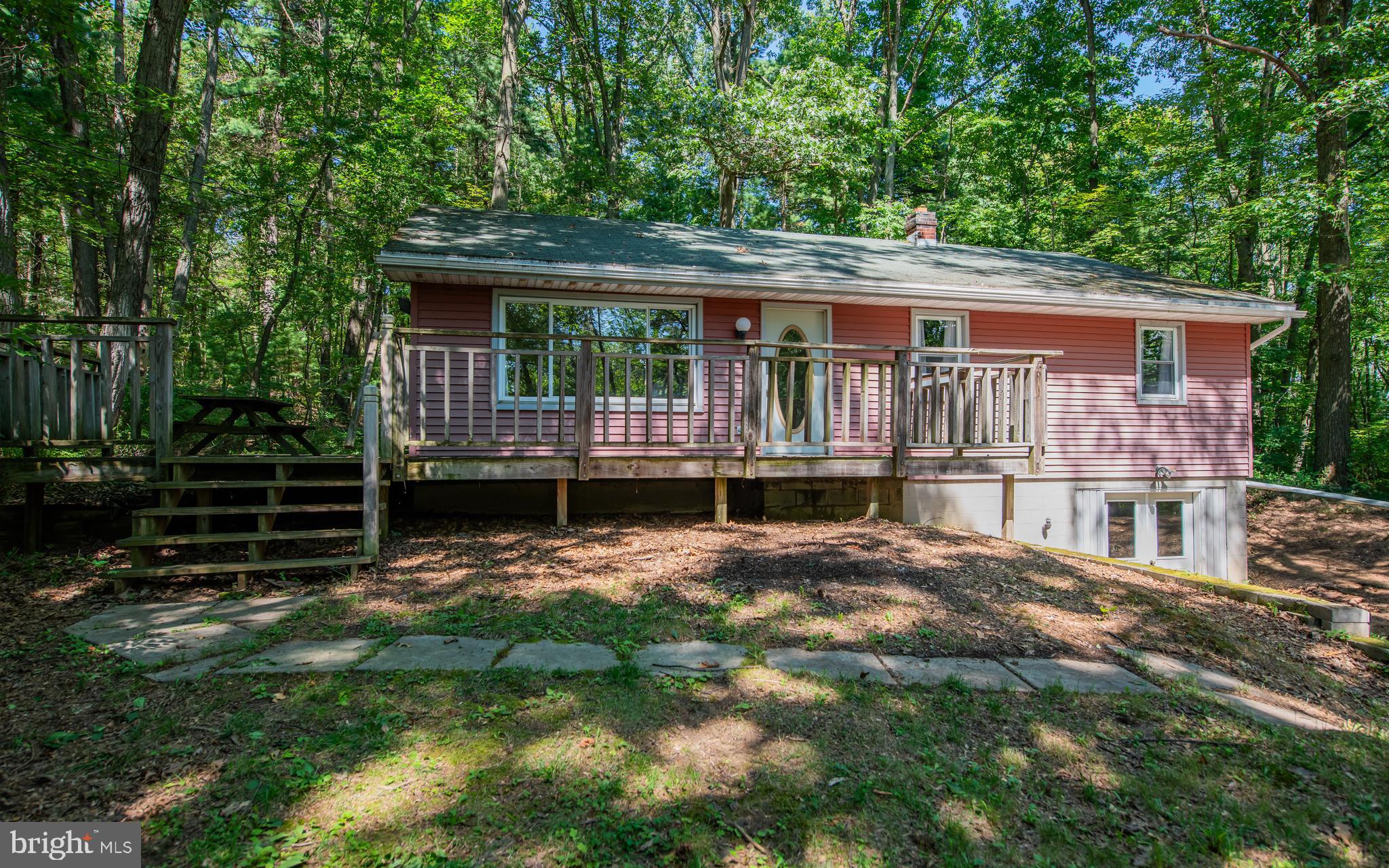 ''Ranch in the Woods'' This is a 3 bedroom 1 bath home with lots of potential. Updates needed. Many of the rooms have hardwood floors. It is an ''As Is Sale''