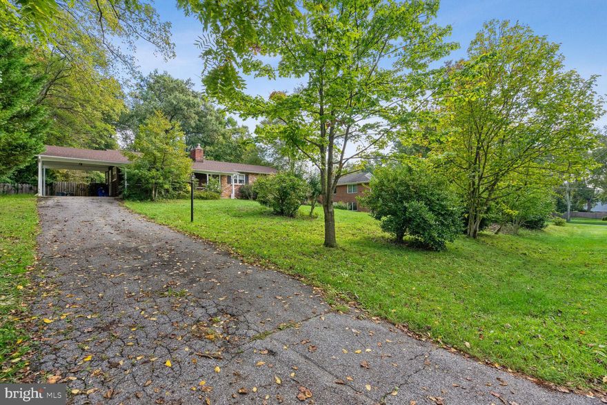 Fantastic sparkling rambler in beautiful neighborhood. Lovely large fenced back yard with mature trees and shed. Center hall slate entry foyer.  A brick, wood burning fireplace on main level and also in the basement Stainless dishwasher and Jenn -Air double wall oven, surface cooktop. Hardwood floors, sliding glass doors from the dining room to the beautiful deck overlooking patio and wonderfful backyard. Expansive rec room and play area in the basement.  Perfect location in charming neighbothood close to major commuter roads , shopping, schools Roof was replaced 2 years ago.   No pets.  Fence and shed 'as is'. Processing fee is $55.00. Owner has maintenance agreement for furnace with Burtonsville Fuel.  Tenants must use that company to supply oil at tenants' expense. 24 hour notice required for showings between 10am and 4pm. No showings on Monday and Thursday.