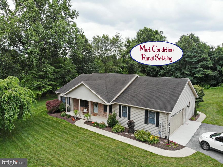 Rancher - Rural Setting -Mint Condition- Open Floor Plan- Lower Lever Completely  Finished- Porcelain Tile Flooring- Granite Counters in Kitchen - Master Suite with Whirlpool Tub- Large Composite Deck With FirePit