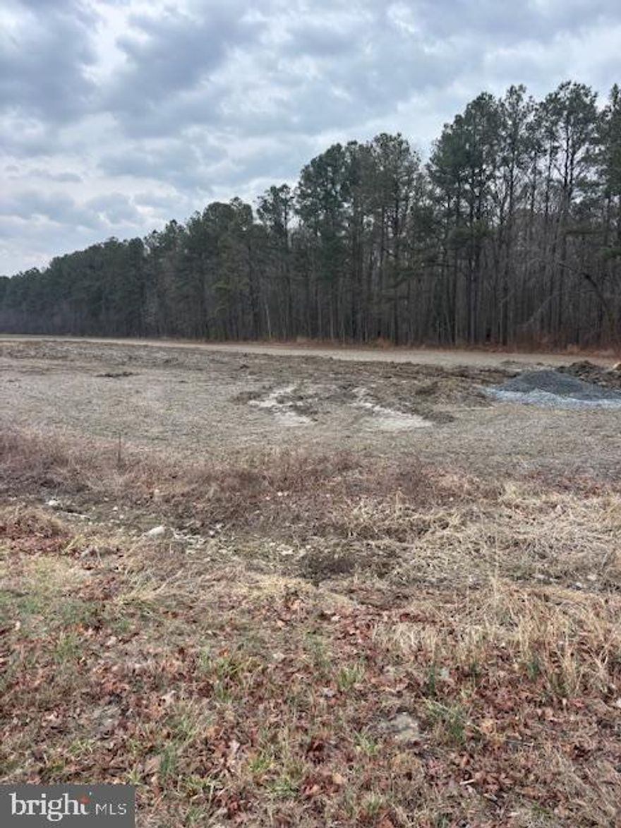 Cambridge - this lot is  close to town, but still offers a country feel!  Corner lot backs to woods.  Quick access to Rt. 16 and Rt. 50.  City water and sewer.  Not many like this !!