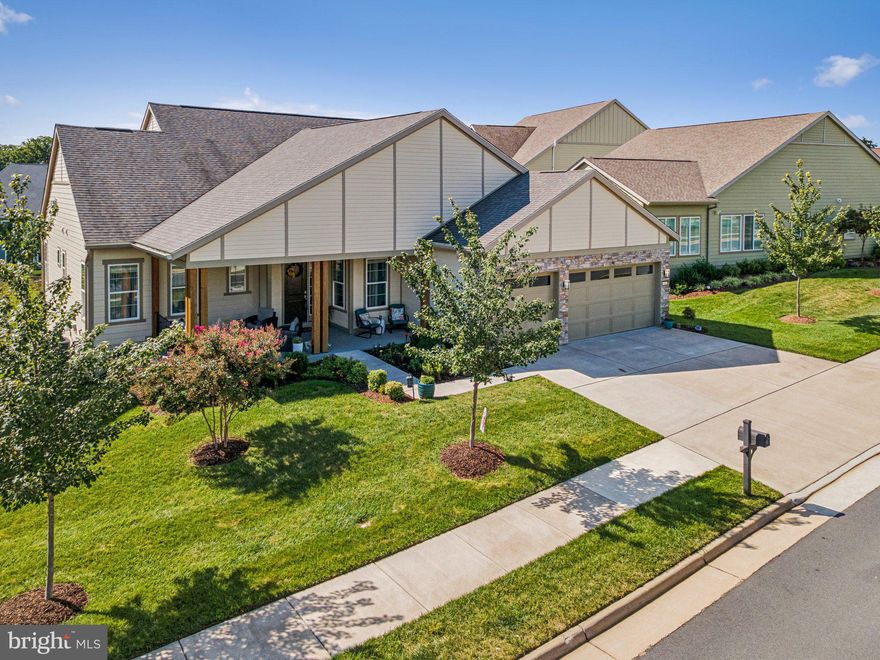 Welcome to the Hensley model by Shea Homes, built in 2018 and thoughtfully designed for modern living. From the moment you arrive, the curb appeal shines with a three-car garage, a welcoming covered front porch, and outdoor living spaces that continue around the back of the home. A screened porch extends from the great room on the main level, offering the perfect spot to enjoy fresh air in comfort, while a spacious patio off the lower-level walkout adds even more options for entertaining or relaxing.
<br><br>
Inside, the home’s open layout is filled with natural light and features a stunning kitchen at its heart. The kitchen showcases a sleek center island, granite countertops, mosaic tile backsplash, and contemporary fixtures, all enhanced by today’s stylish décor colors. This space flows seamlessly into the great room and dining area, creating a warm and inviting atmosphere that is perfect for both everyday living and hosting friends and family.
<br><br>
The main level offers three bedrooms, thoughtfully arranged for convenience and comfort. The primary suite is a true retreat, with a luxury bathroom that includes a double vanity, soaking tub, frameless glass shower, and a spacious walk-in closet. A modern shiplap accent wall adds character and style to the suite. Two additional bedrooms share a well-appointed full bathroom, making the main level ideal for guests or multi-generational living. A dedicated laundry room on this level adds everyday ease.
<br><br>
The lower level expands the living space with a fully finished walkout basement that is just as light-filled as the upper floors. Here you will find a huge recreation area perfect for lounging or entertaining, a game room for fun activities, and two additional bedrooms with a full bathroom. This flexible layout allows for a guest suite, home office, or space for hobbies, ensuring the home can adapt to your lifestyle.
<br><br>
With its modern finishes, open design, and versatile spaces both indoors and out, this Hensley model offers the perfect balance of style and functionality, ready to be enjoyed for years to come.
<br><br>
As a resident of Trilogy at Lake Frederick, you'll enjoy a wealth of incredible amenities designed to enhance your lifestyle. Dive into relaxation with both indoor and outdoor pools, stay active in the state-of-the-art fitness center, and unwind at the well-equipped community clubhouse. Savor gourmet meals at the farm-to-table restaurant and socialize in the exclusive members-only lounge. For the sports enthusiasts, tennis and pickleball courts, as well as a dog park, offer ample opportunities for recreation, while extensive lake trails beckon for serene strolls and outdoor adventures. Join a vibrant community of welcoming neighbors and future friends. Experience the pinnacle of resort living at Trilogy at Lake Frederick—where your dream home and ideal lifestyle come together seamlessly.