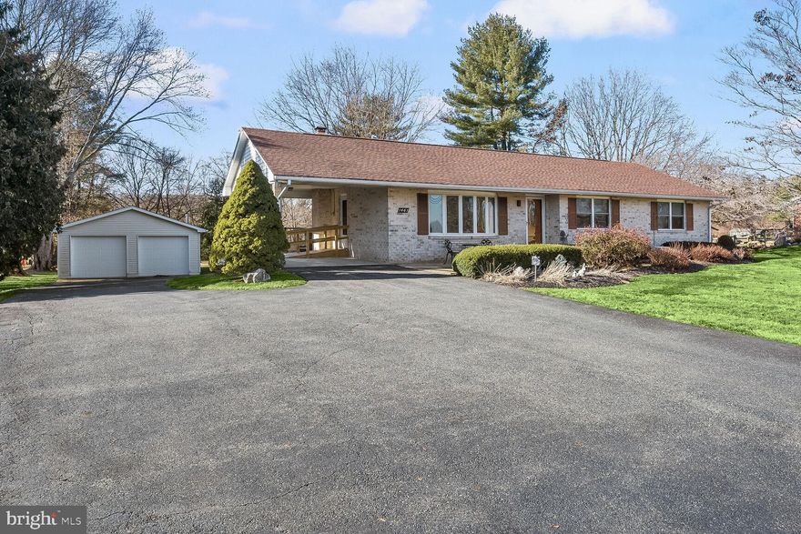 Experience the allure of this stunning 4-bedroom, 2.5-bathroom rancher situated on
over 1.5 acres of meticulously landscaped grounds. A charming walkway and front patio
invite you into the living room, bathed in natural light from the bay window that
showcases gleaming hardwood floors and crown molding. The adjoining gourmet
kitchen, perfect for casual dining, features granite counters, stainless steel appliances,
gas cooking, and a convenient breakfast bar. The dining area, adorned with box
wainscoting and crown molding, opens to a wrap-around style deck, offering panoramic
views of the scenic rear lawn. Discover the remarkable primary bedroom suite, boasting
a soaring cathedral ceiling, double closets, an en suite bath with heated floors, and a
private walkout to the deck—a serene spot for enjoying your favorite beverage. Three
additional bedrooms, one featuring a convenient yet easily removable washer and
dryer, and a full bath complete the tranquil sleeping quarters. Entertain in the expansive
recreation room, featuring a hearth-raised, brick surround fireplace just waiting for the
existing pellet insert to be hooked up or can be easily converted back to a fireplace! A
bonus room with a walk-in closet serves as an ideal guest or craft room. The potential
in-law suite adds versatility with its kitchenette and adjoining studio living space. A
second laundry room and powder room complete the flexible lower level. Your vehicles
and lawn equipment find refuge in the detached, propane-heated 2-car garage with a
conveying air compressor, complemented by an additional shed for seasonal items and
gardening tools. The carport and extended driveway offer even more parking options!
Revel in the surrounding amenities, including Rocks State Park, historic Jerusalem Mill
Village, Harford Vineyard and Winery, local farms, and markets. Convenient commuter
routes, including MD-23, MD-165, and MD-24, enhance the accessibility of this
extraordinary home. Embrace the perfect blend of comfort and convenience!
*Note: Some interior photos have bee virtually staged.