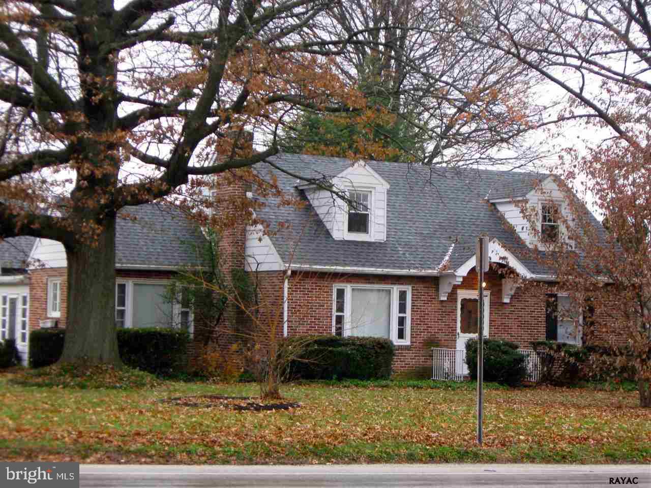 Brick Cape Cod on Corner Lot! Gar & Parking on 3rd Ave LR, DR, BR's w/Hardwood Flrs LR w/Wood Burning FP, Open Staircase to 2nd Fl Cherry Kit w/BI Breakfast Bar, Range, DW, Refrigerator Remodeled BA Formal DR w/French Door to Breezeway/Sunroom 2 BR's upstairs, one with Dbl Closet Brick Patio Flagstone Walkway One Car Gar w/Dr Opener & Storage Washer/Dryer Incld.