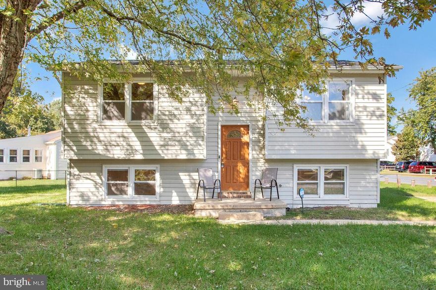 This charming home is in a quiet neighborhood. Brand new roof on house and garage.  Features hardwood floors and a new main-level bath with a subway tile shower. The spacious kitchen has plenty of cabinet space, granite countertops, and stainless steel appliances.  A door with side windows leads to a deck. The Primary bedroom on the lower level has a walk-in closet, an en-suite bath with a jetted tub, and a nice-sized family room. The detached garage is perfect for extra storage or working on your car.  The seller is offering $500.00 towards a home warranty of the buyer's choice.  The seller prefers to sell as is; the house has been well-maintained and is in great shape.