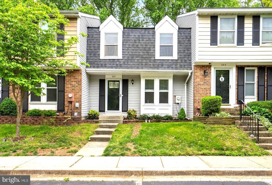 Located in a cul-de-sac in the Oakmont subdivision, nestled within the Bay Hills community and shopping area, welcome home to this move-in-ready townhome in the heart of Arnold! Broadneck school district! As you open the beautiful updated front door, you’ll find newer upgraded LVP flooring throughout. The living room features a lovely electric fireplace and flows seamlessly into the dining and kitchen area. As you head into the kitchen, you’ll instantly be the envy of your friends with new cabinets, quartz countertops, a stunning backsplash, and stainless steel appliances. A bonus island has been installed for added counter space and seating! Your dining area offers a seamless transition to the outdoors. Step out onto your private back deck, which will quickly become your favorite spot for morning coffee or a late-night beverage overlooking a lush, wooded backdrop. Enjoy countless evenings entertaining friends and family outside!  All the stairs have new plush carpet. Upstairs you’ll find a spacious primary suite complete with updated LVP flooring, a private, improved en-suite bathroom and a generous walk-in closet with newer carpet. Two additional bedrooms with updated LVP flooring and a hallway bath provide plenty of room for family, guests, or a dedicated home office. The finished basement adds incredible value and versatility to the home. Whether you’re hosting a movie night by the cozy fireplace or need extra space for a gym, this level delivers. It also includes walk-out patio access, a laundry room, and plenty of storage space to keep life organized. New lighting throughout. Newer windows and slider. Just a short walk to Bay Hills Shopping Center, featuring local favorites like Rise Up Coffee and Green Valley Marketplace. The Broadneck Peninsula Trail is also just steps away, offering miles of paved paths for biking and walking. Perfectly located with quick access to Rt. 2 and Rt. 50, you’ll enjoy a 15-minute drive to Annapolis and an easy 25-minute commute to Fort Meade. Experience the perfect combination of privacy and accessibility, schedule your showing today!