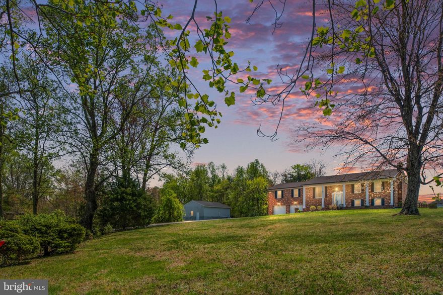 COMING SOON! Stunning brick home! Over 3000 square feet on over 1 acre in South Stafford! Enjoy this spacious and private retreat and still be only 10 minutes from the VRE station!  This home boasts a large kitchen with center island, dining area, spacious family room and 3 bedrooms all on the main level. The lower level has a 4th bedroom, recreation room that can be used as an additional bedroom, laundry/mud room and space for a home gym AND home office! Enjoy the gorgeous and expansive front yard with small creek at the front property line or the level, fenced backyard with screened porch and deck with plenty of additional space on the side for your garden!
30x20 Detached garage in rear is perfect for recreational vehicles or your bass boat!  Electricity in detached garage, RV hookup and pad on the exterior. 
Additional photos coming soon.  Available for showings on Thursday April 17th.  Schedule now!