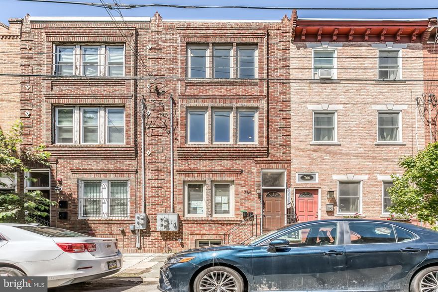 Welcome to 768 S 15th Street, Unit B, a beautifully designed 3-bedroom, 3-bathroom home offering 1,800 square feet of modern living space in the heart of Graduate Hospital. Step inside to gleaming hardwood floors and a bright, open-concept living and dining area flooded with natural light from oversized windows. Just off the living room, enjoy seamless indoor-outdoor living with access to your private deck—perfect for morning coffee or evening relaxation. The kitchen features stainless steel appliances, white shaker cabinetry, granite countertops, and a subway-tile backsplash, providing both style and functionality. A spacious bedroom and a full bathroom complete this level. Upstairs, you’ll find two generous bedrooms, each with ample closet space and their own en-suite bathroom for ultimate privacy and convenience. Located just minutes from Rittenhouse Square and Center City, you’ll have easy access to top restaurants, cafes, parks, grocery stores, and nightlife. Don’t miss this incredible opportunity—schedule your showing today!