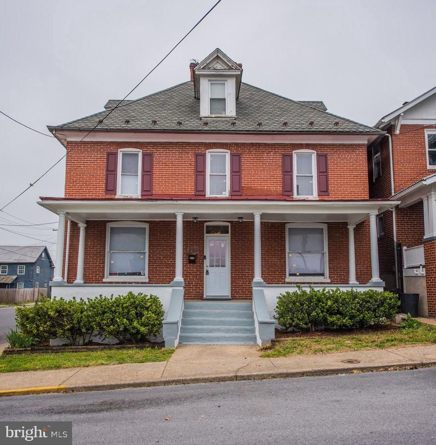 Beautifully renovated home on a corner lot in Martinsburg with 4 large bedrooms and 2 full bathrooms. There are a lot of original features including built-ins and beautiful wooden pocket doors. Brand new HVAC system and new flooring throughout.